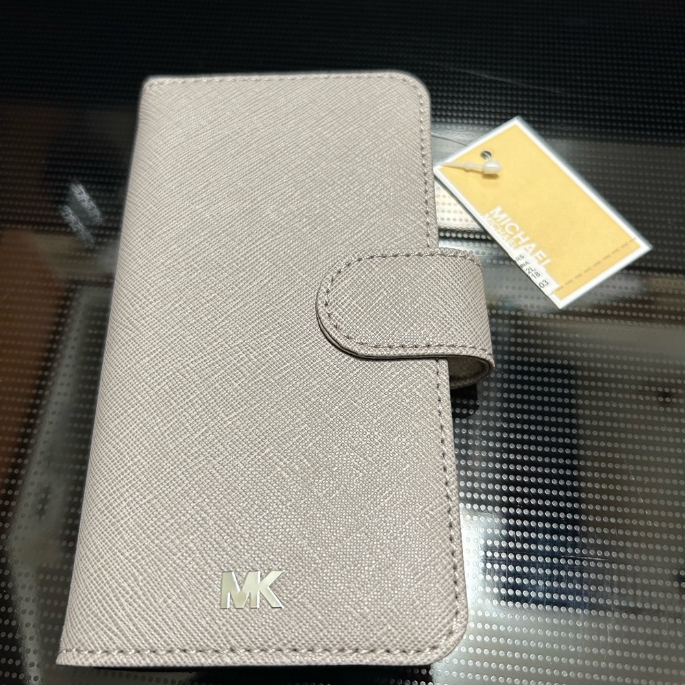 Michael Kors iPhone 7 or 8 Electronic Leather Folio & Wrist Strap phone case.